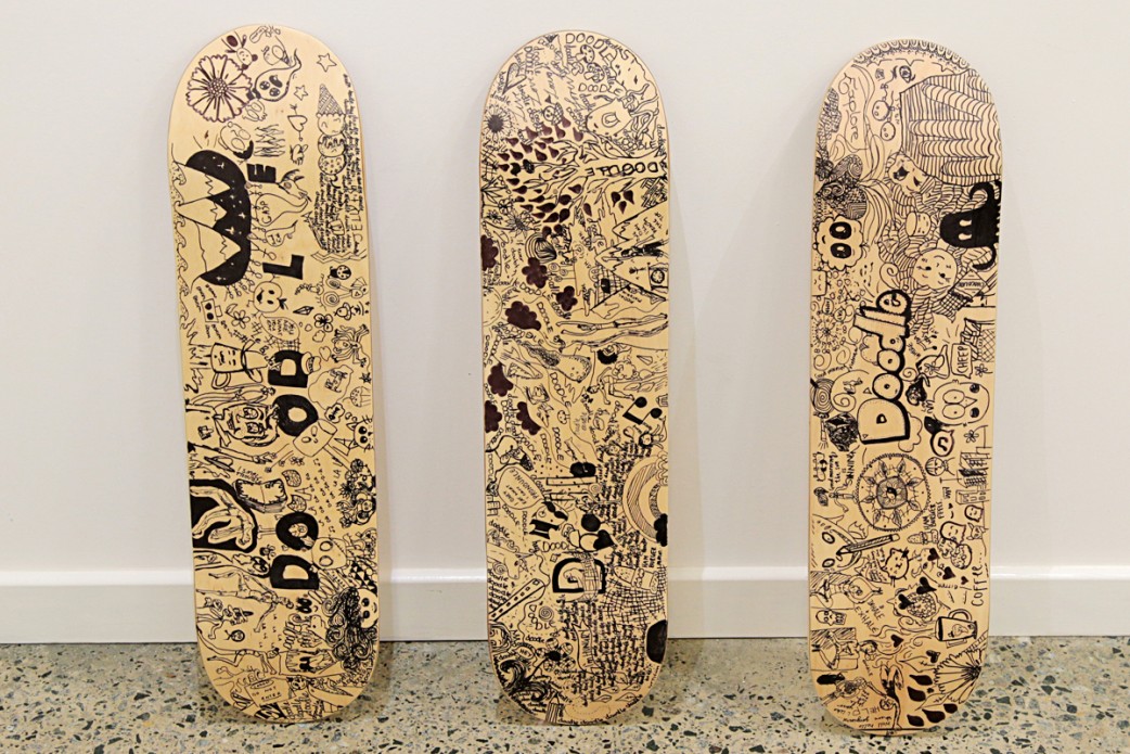 Collaborative skateboard deck art